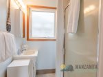 Full bathroom with shower. Located next to the living room. 